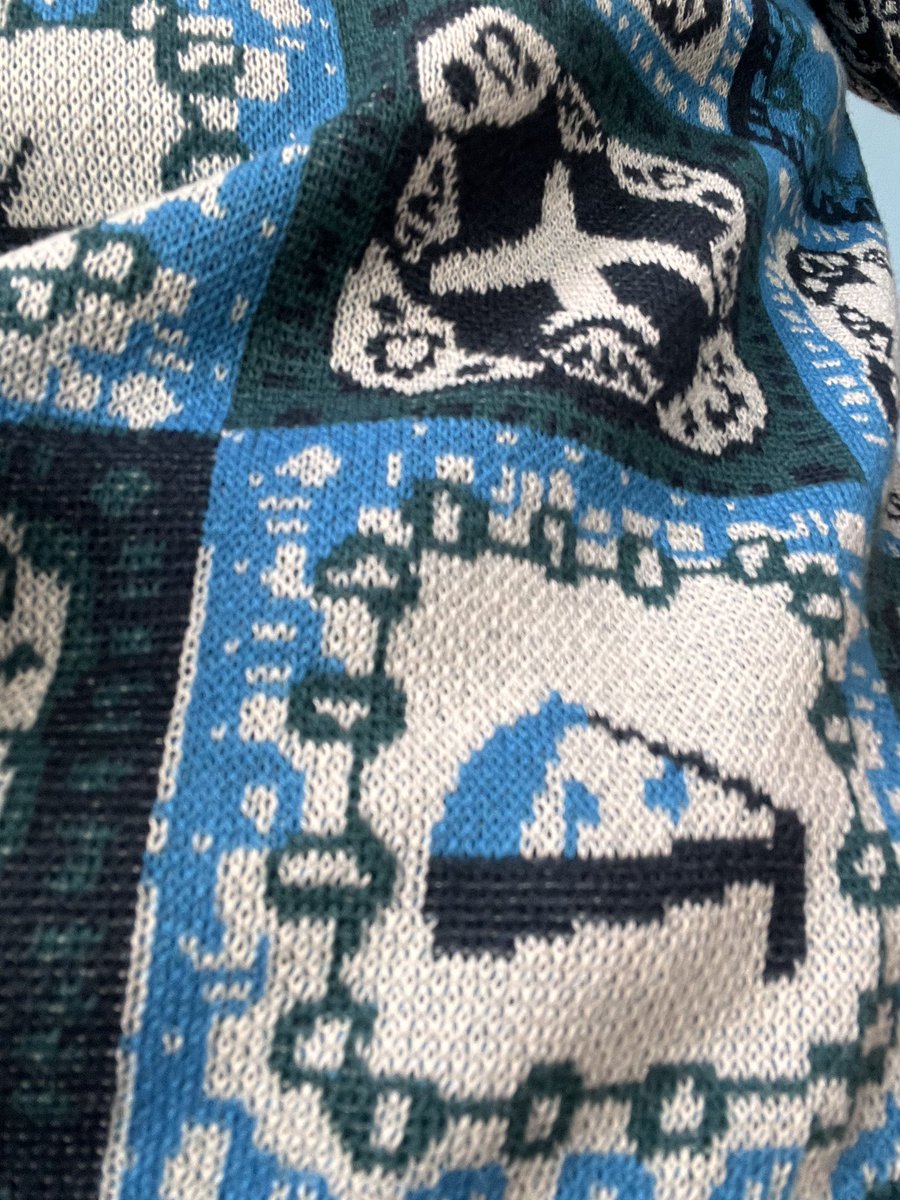 lis_tor19's tweet photo. @AlaskaAir my mom works for you at the Hub in Operations and she got your Christmas sweater! But she’s curious what this part of the sweater is!? https://t.co/DJt48tqxsg