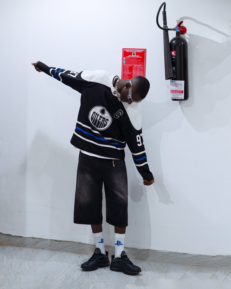 shades on, looking icy, you dey whine me?