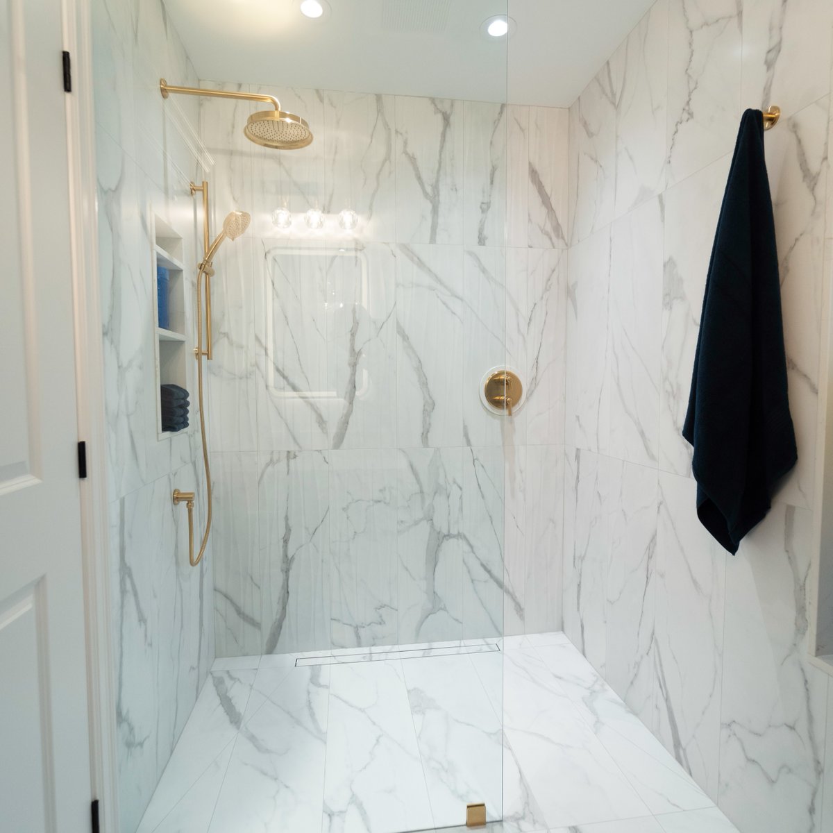 mike_holmesjr's tweet image. We recently renovated this bathroom for a very deserving couple. They had one bathroom and we decided to build a curbless shower to make it easier for him to get in and out of the shower 🚿 
We use the @schluterNA linear drains and they're awesome!
#bathroomreno