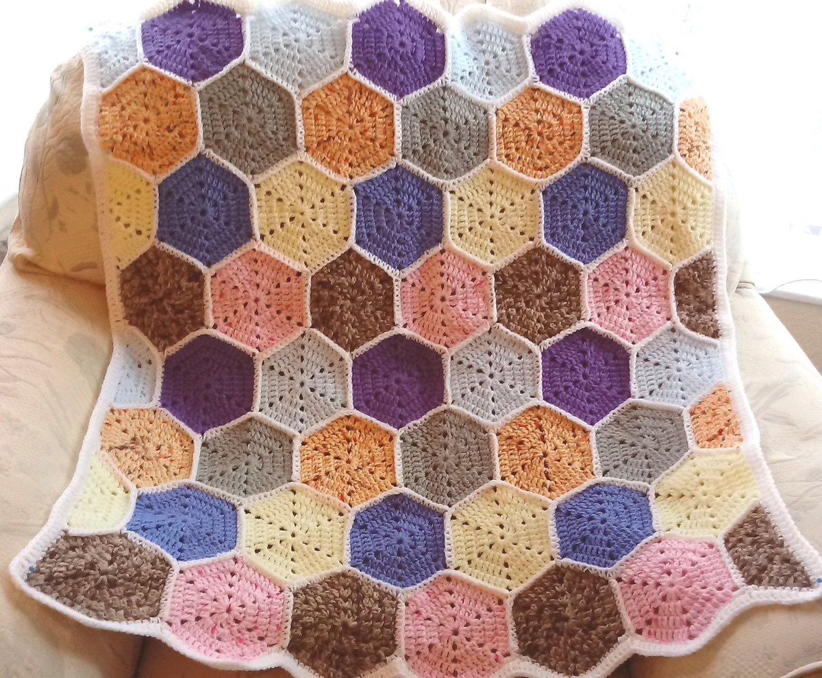 kernowclaire1's tweet photo. A lovely crochet blanket with hexagons pattern and a white edging. A lovely gift for Christmas, handmade in Cornwall #oneofakind #crochetblanket #lapblanket #handmadegift #handmadeincornwall #winterwarmer https://t.co/lJvkba65ua https://t.co/HM9jG4sTbZ