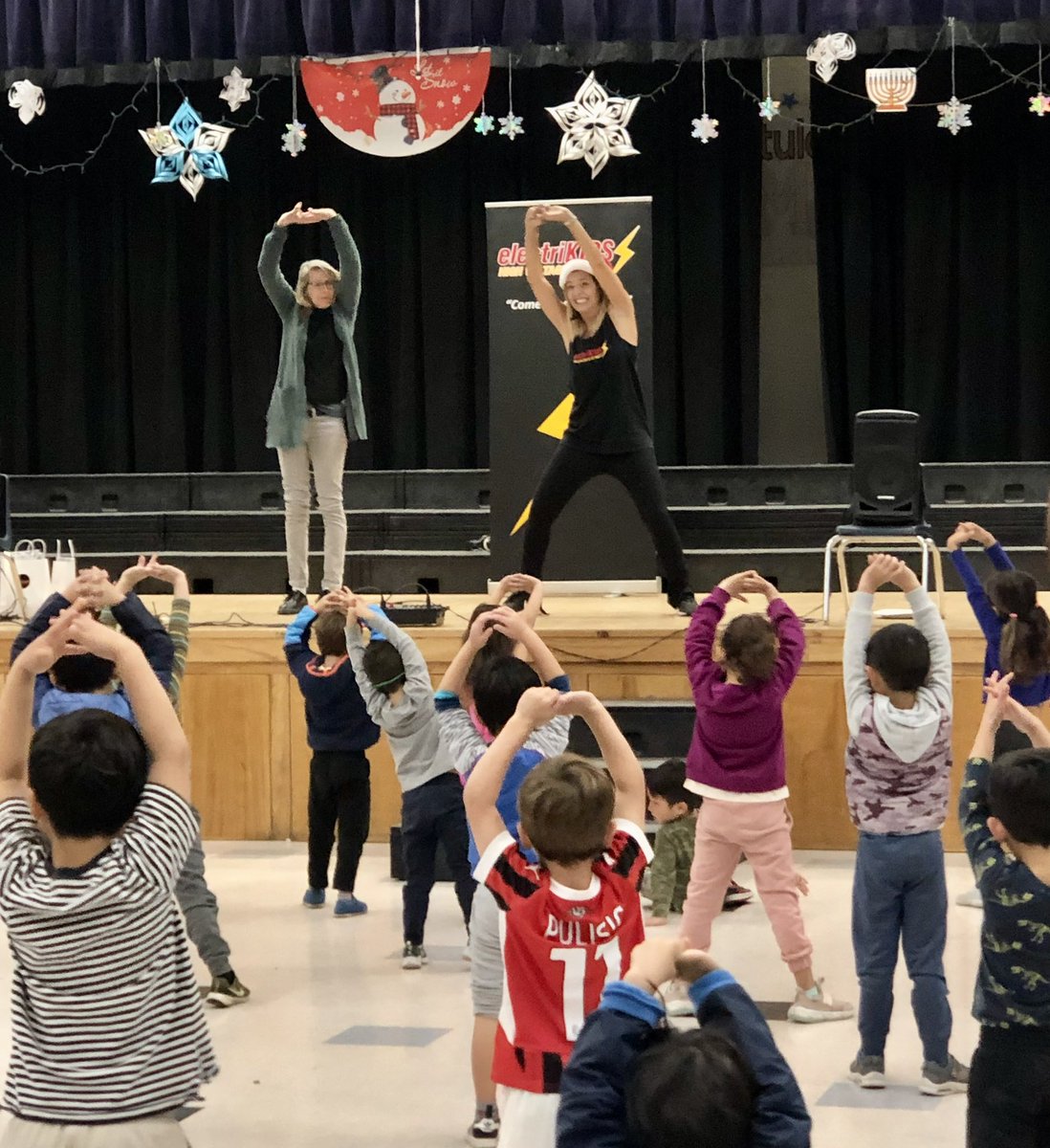 electriKIDS's tweet photo. Thanks to Ms. Duncan for joining us on stage during our #Holiday #Workout at Montemalaga. Your students loved seeing you up there! @pvpschools @MontemalagaPTA @CurtisChin_PV https://t.co/TmHUH5bVDG