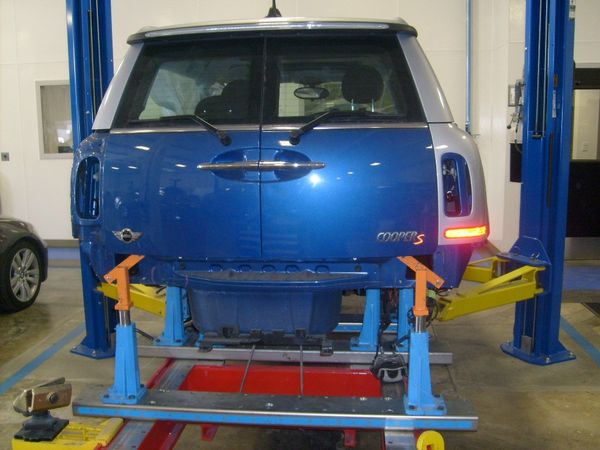 Celettegroup's tweet photo. #Mini #Cooper #Clubman sustained damage to its rear end. It is now securely positioned on a #Celette #framemachine, using our dedicated jigs specifically designed for this Mini model. This setup will ensure that the car is restored to its original OEM specifications. https://t.co/0hObQnDVBn