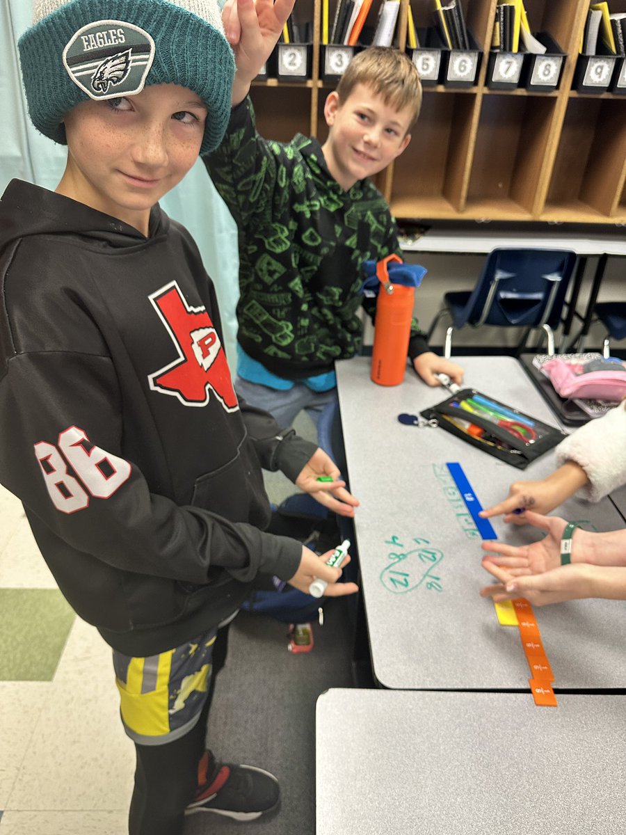 MrsBmath5's tweet photo. Fractions! Fractions! Everywhere! Such a fun day exploring common denominators! @CockrellChamps https://t.co/BxDkjjUl8B