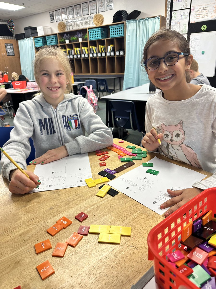 MrsBmath5's tweet photo. Fractions! Fractions! Everywhere! Such a fun day exploring common denominators! @CockrellChamps https://t.co/BxDkjjUl8B