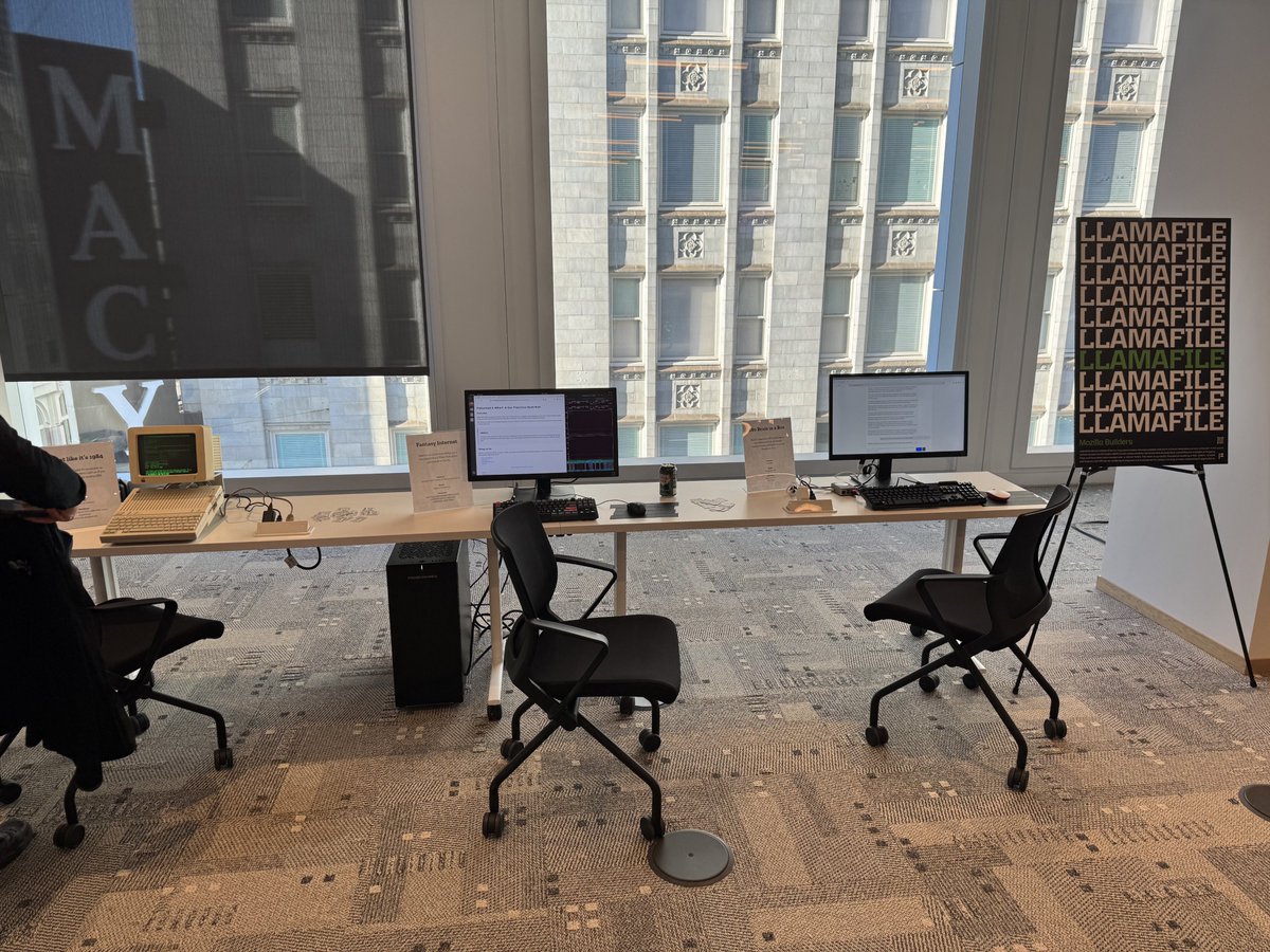 JustineTunney's tweet image. Just got back from Mozilla Builders Demo Day. Here's some photos of the @llamafile booth as well as slides from an @openwebui talk via @MattBCool.