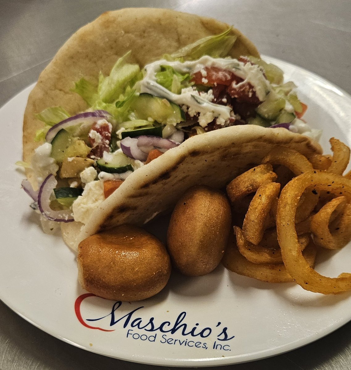 maschiofood's tweet photo. A warm #smile and a delicious #gyro = happy students🤗 Chef Ronnie is Greek goodness today! Choice of Beef, Chicken and #falafel Gyros, #wholegrain Loukoumades for dessert. #schoollunchrocks #studentlunch #schoolcafeteria #vegetarian #chef https://t.co/VQhGJkchvC