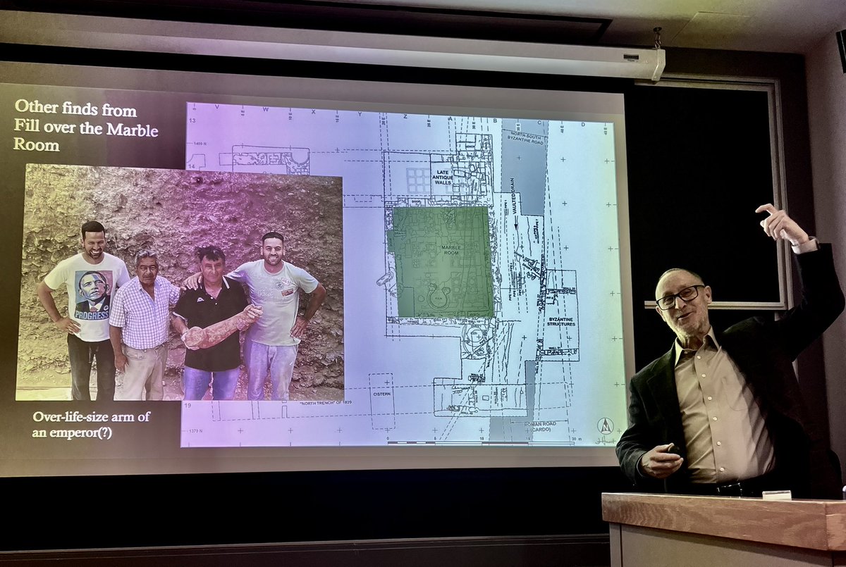 Christopher Pfaff presenting and enacting an over-life-size arm of an emperor(?) found during the 2018-24 excavations at the northeast of the theater at Corinth at the Department of Classical Studies at UPenn <a href="/UPennSAS/">UPenn SAS</a> #corinthexcavations <a href="/ASCSAthens/">ASCSA</a>