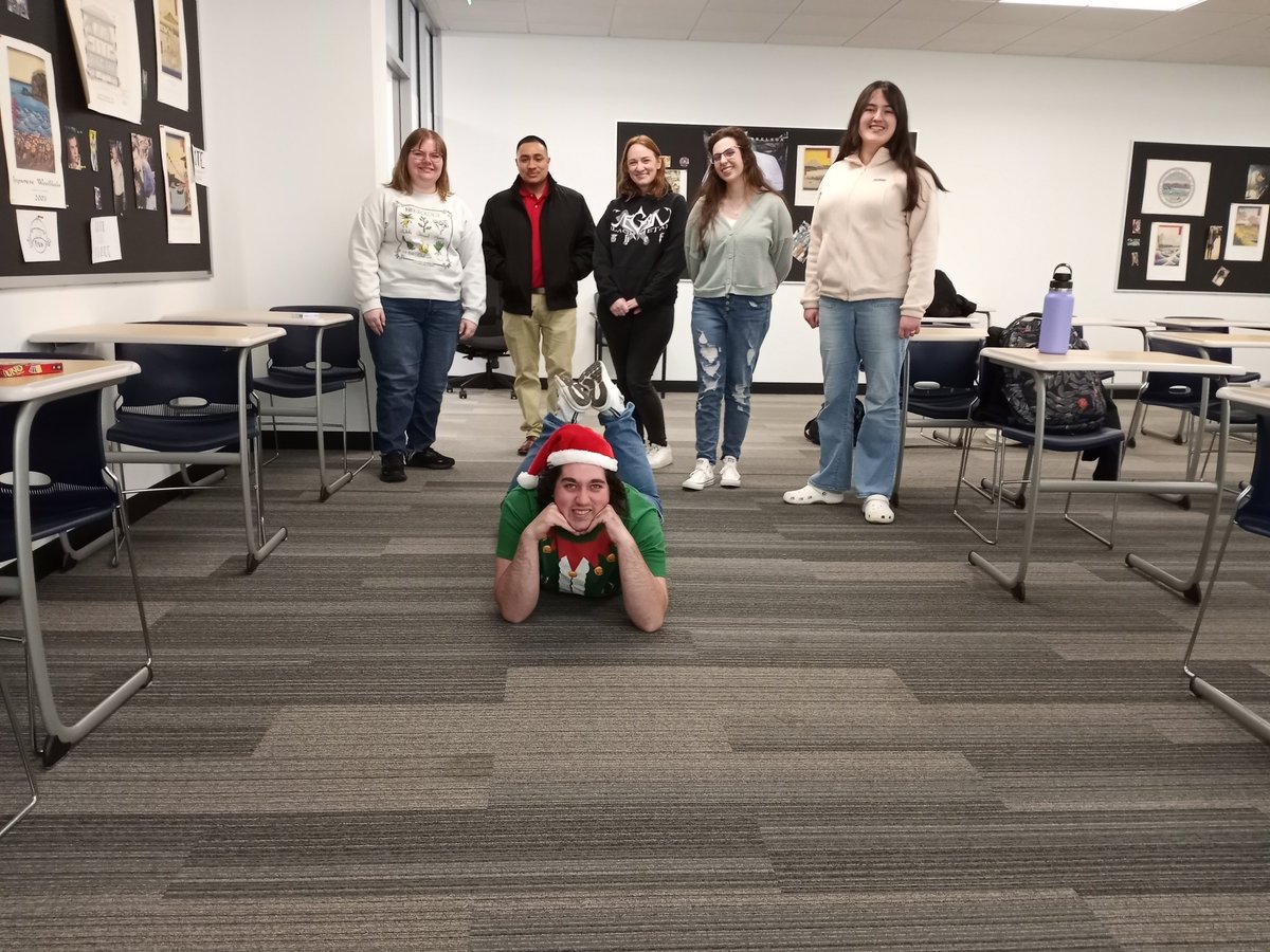 OmicronEta's tweet photo. We had our end-of-semester/holiday party today, and then we crashed the Philosophy Club's meeting to sing "Jingle Bells" to them. https://t.co/E29pRKhZL1