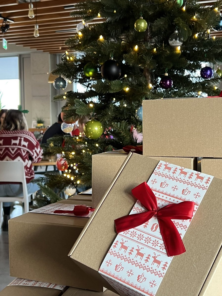 Santa dropped by our office! What did you find under the Christmas tree today? 🎄🎁