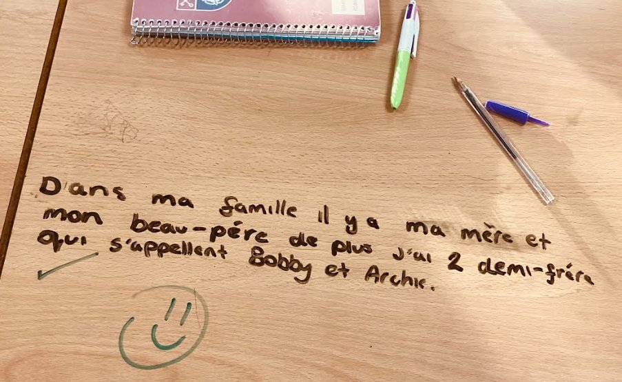 Huxlow's tweet image. Yesterday, our Year 7 students showcased their linguistic talents in French class, and we couldn&apos;t be prouder! Miss Maubert was truly impressed with the high quality of sentences the students wrote about their families, right on their tables. #Ambition #Pride #FrenchClass