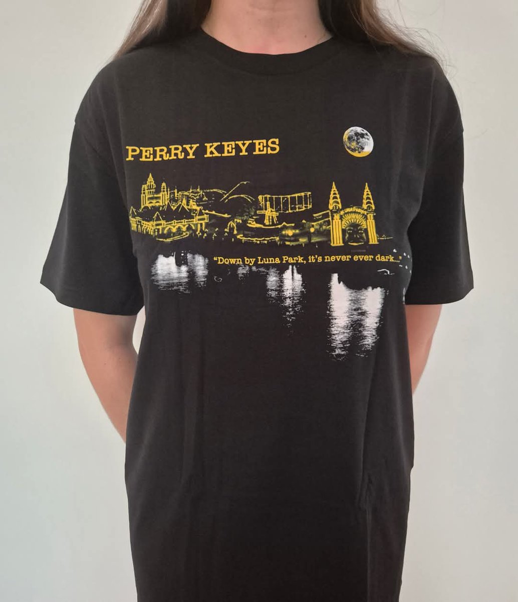 And now...t-shirts.
There's a limited run of these T-shirts for our shows in Sydney on Jan 5 (ticket link in the post below this one).
You can get them through the Bandcamp link here and they will also be on sale at the shows.
perrykeyes.bandcamp.com/merch/down-by-…