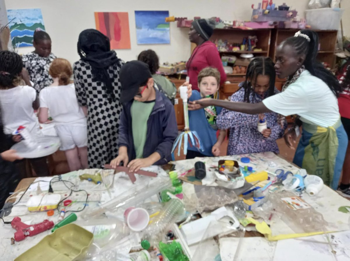 ISU_PYP's tweet photo. Future Forest Project, connecting #ISUGrade4 with a team of women who help keep plastic off the streets of Kampala. Great to see children &amp; adults working hard together to create beautiful forest-inspired plants &amp; creatures #ISUConnects #ISUContributes #IBPYP #PYPAction https://t.co/d5QpnmOyvr