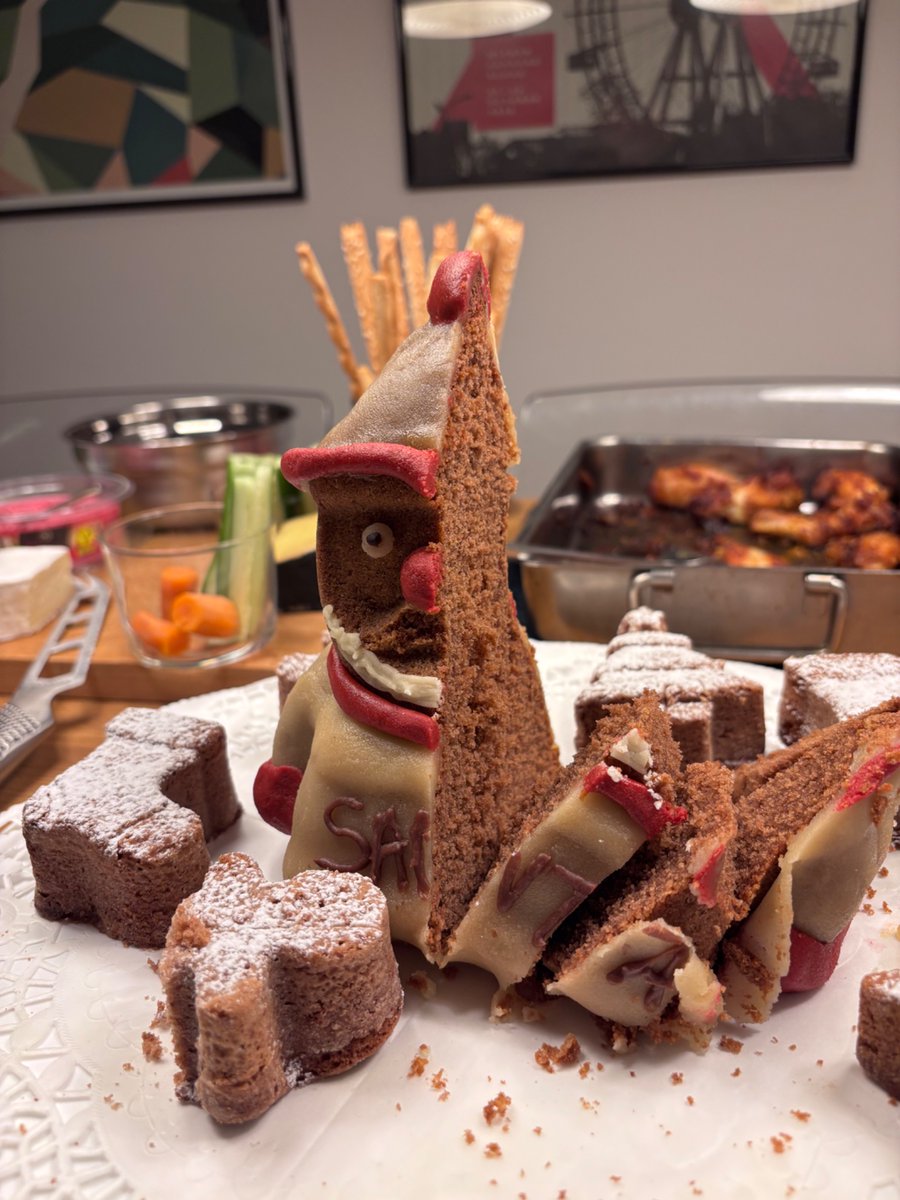 ISTAustria_IOF's tweet photo. Sabine from our Imaging &amp; Optics Facility (IOF) team surprised us with her impressive baking skills, and brought an IOF - ‘Krampus’ - Tiramisu and an very tasty gingerbread Santa 🎅🏼 
This is all very well matching the Feuerzangenbohwle that we also prepared for the occasion 🤩 https://t.co/v1CgGJ37CD