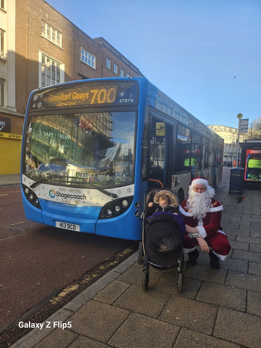 Shaunland13's tweet photo. #SantaBusSouth @StagecoachSouth my daughter with santa aka colin ayres on route 700 https://t.co/hYAwLNRYKX