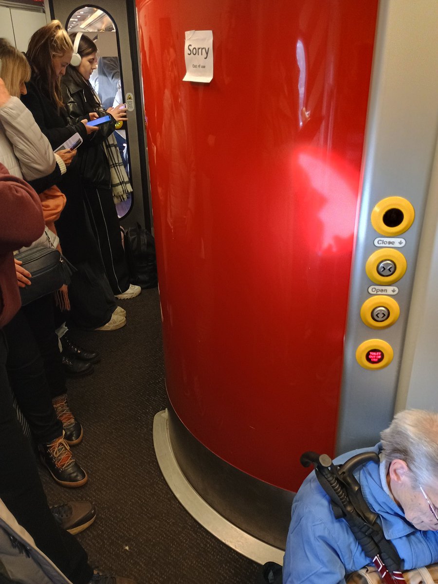 GarethCeredig's tweet photo. Hi @CrossCountryUK. Ever thought about using the money from those £143 Birmingham - Newcastle tickets to buy more carriages? Just so you don't have blind people &amp; pensioners with walking sticks sitting on the floor by the one (out-of-order) toilet. Because this is a disgrace. https://t.co/CJH5KkuhjL