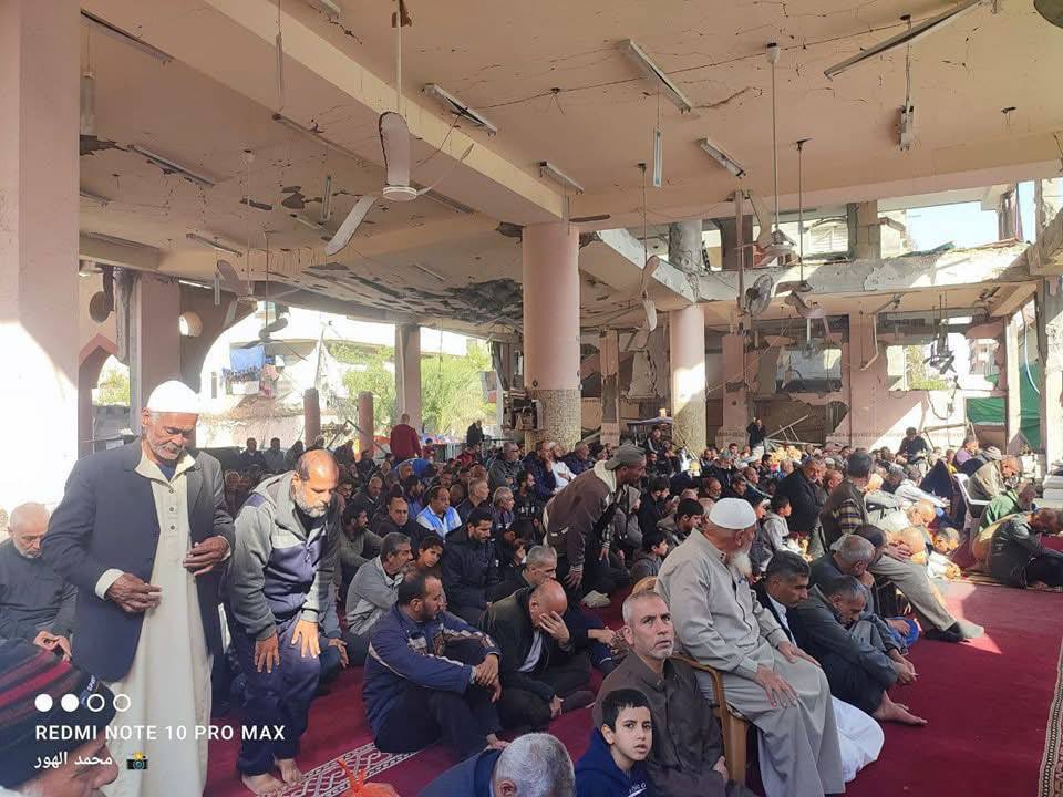 gazanotice's tweet photo. Palestinians perform Friday prayers amid the rubble of the destroyed Al-Farouq Mosque

In the Nuseirat Refugee Camp, located in the central Gaza Strip, Palestinians gathered for Friday prayers amid the rubble of the Al-Farouq Mosque, heavily damaged by Israeli airstrikes.

The mosque was largely destroyed in an airstrike carried out by the Israeli military on November 23, 2024. Despite the devastation, Palestinians came together among the debris to perform their prayers, demonstrating their resilience and unwavering commitment to their faith.

The attack on Al-Farouq Mosque has drawn international criticism, while the Palestinians’ determination to maintain their religious practices under such challenging circumstances stands as a testament to their steadfastness and spiritual devotion.