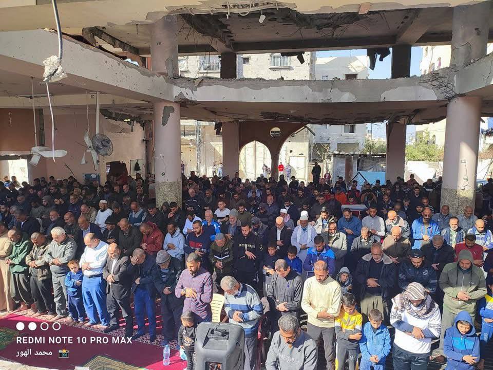 gazanotice's tweet photo. Palestinians perform Friday prayers amid the rubble of the destroyed Al-Farouq Mosque

In the Nuseirat Refugee Camp, located in the central Gaza Strip, Palestinians gathered for Friday prayers amid the rubble of the Al-Farouq Mosque, heavily damaged by Israeli airstrikes.

The mosque was largely destroyed in an airstrike carried out by the Israeli military on November 23, 2024. Despite the devastation, Palestinians came together among the debris to perform their prayers, demonstrating their resilience and unwavering commitment to their faith.

The attack on Al-Farouq Mosque has drawn international criticism, while the Palestinians’ determination to maintain their religious practices under such challenging circumstances stands as a testament to their steadfastness and spiritual devotion.