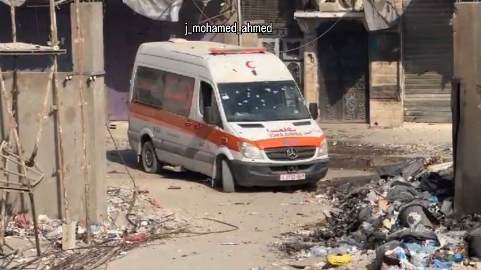 gazanotice's tweet photo. Israeli occupation forces open fire on ambulances in front of Kamal Adwan Hospital

Ambulances attempting to evacuate the wounded in front of Kamal Adwan Hospital, located in northern Gaza, came under fire from Israeli occupation forces.

According to eyewitness accounts, Israeli soldiers targeted ambulances arriving at the hospital gates, preventing medical teams from reaching the injured.