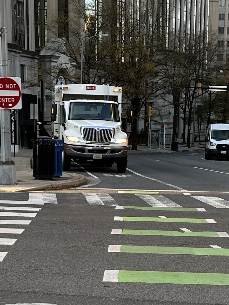 In which <a href="/ArlingtonDES/">Arlington Department of Environmental Services</a> garbage truck driver doesn’t even bother pulling to curb and leaves truck running in <a href="/BikeArlington/">BikeArlington</a> lane IN FRONT OF County govt HQ. 🙄