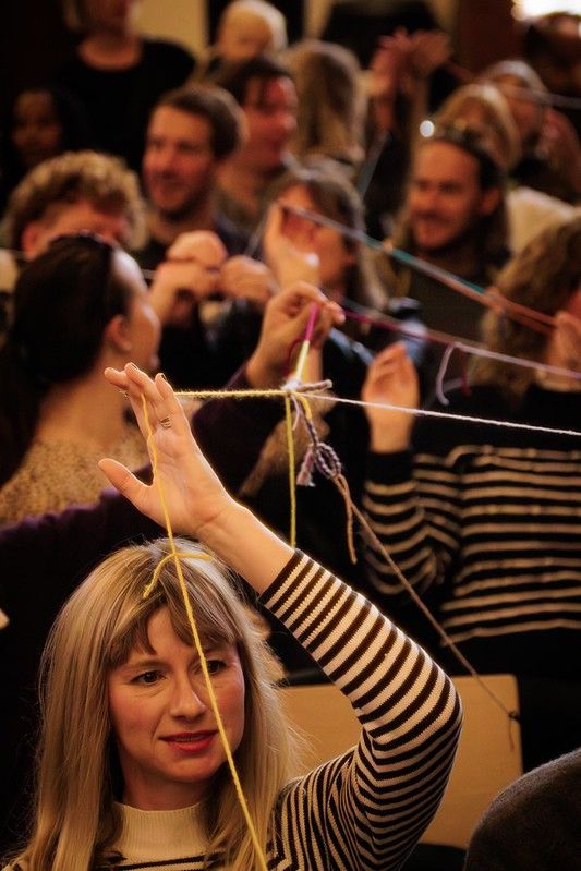 creativemorning's tweet image. Our Raleigh chapter gave their attendees pieces of yarn to tie together; creating a beautiful web of connections at their November event. #CMthread @CM_RDU