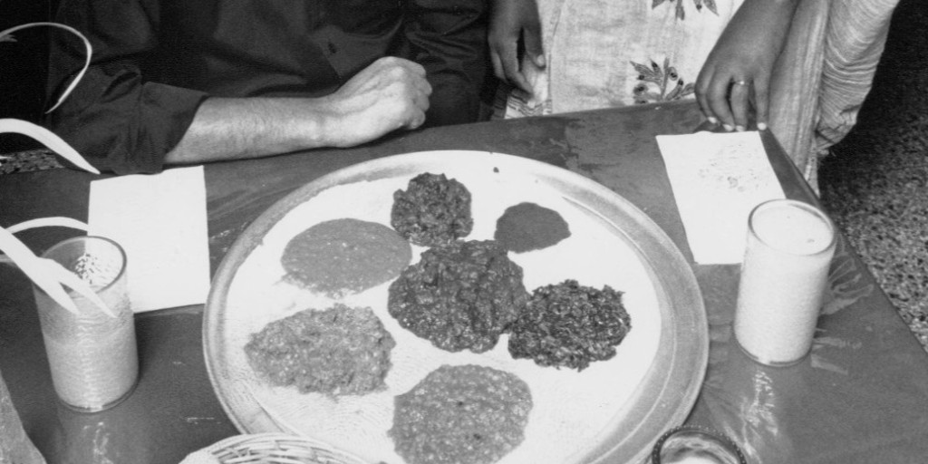 hclib's tweet image. In the early ‘90s, the Surveyor newspaper’s recurring column, "Quality Dining on a Budget Buck,” highlighted restaurants near Elliot Park neighborhood in Minneapolis. Photos of these local eateries are now part of the #ArchivesFeast in the HCL Digital Collections.