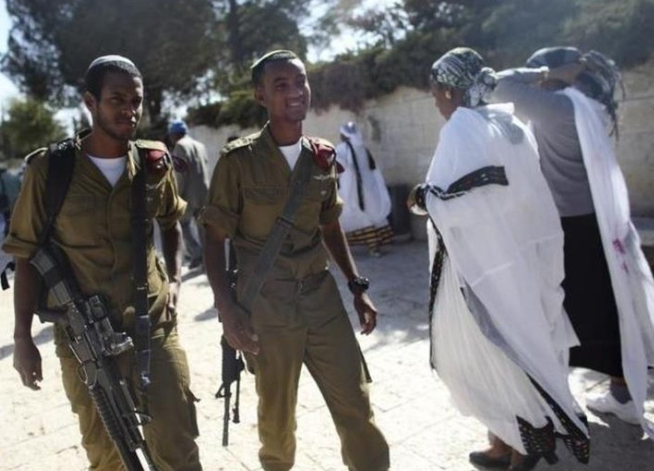 Knowledge_iii's tweet photo. Ethiopian Falasha kill Palestinians whilst fighting for Israel 🇮🇱 

Meanwhile their kids get spate at and called N*******g.

Their women are also made infertile against their will. https://t.co/0zwM1QbNnD