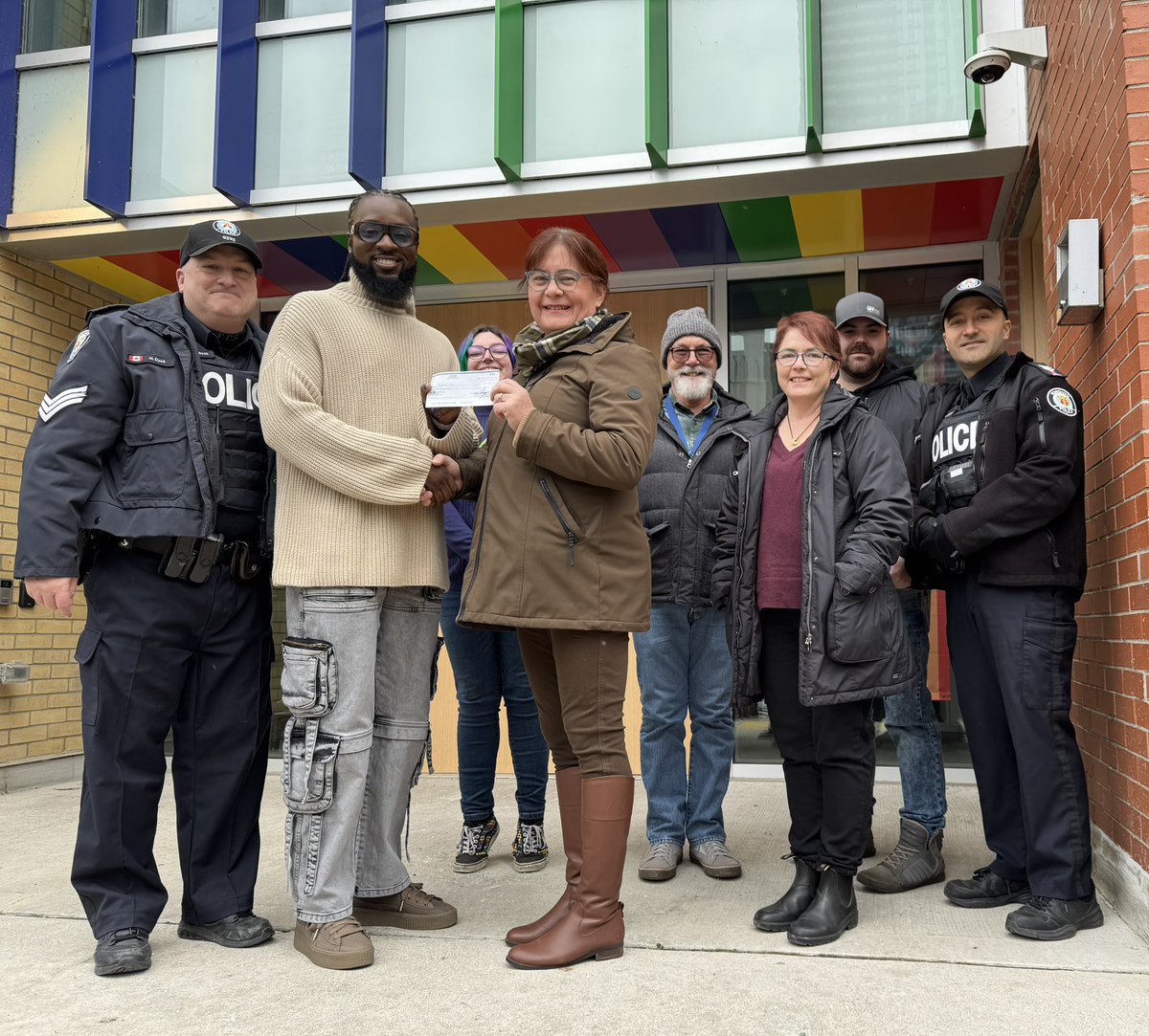Today we presented a check for $4000 to <a href="/friendsofrubyca/">Friends of Ruby</a> from part of the proceeds raised at this year’s First Responder Appreciation &amp; Pride event. Handing over the check is committee member Sofie Lasiuk of <a href="/Toronto_Fire/">Toronto Fire Services 🇨🇦</a>