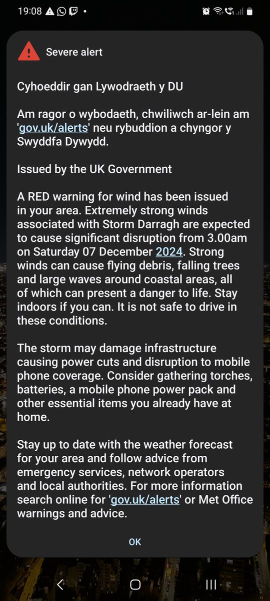 Crumpet_Love's tweet photo. Well, I just received this loud gov ⚠️ alert. Not every day you see a red warning for wind, so I hope it isn't as bad as the Internet suggests! #StormDarragh https://t.co/VCAqEvbenx