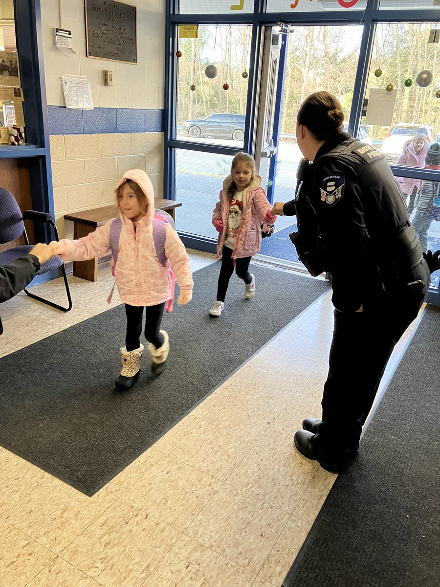 SochaCindy's tweet photo. Fist bumping with the Police Dept and Finn! So much fun! @DouglasSuper1 @Douglasmapd https://t.co/ljaazuDwzr