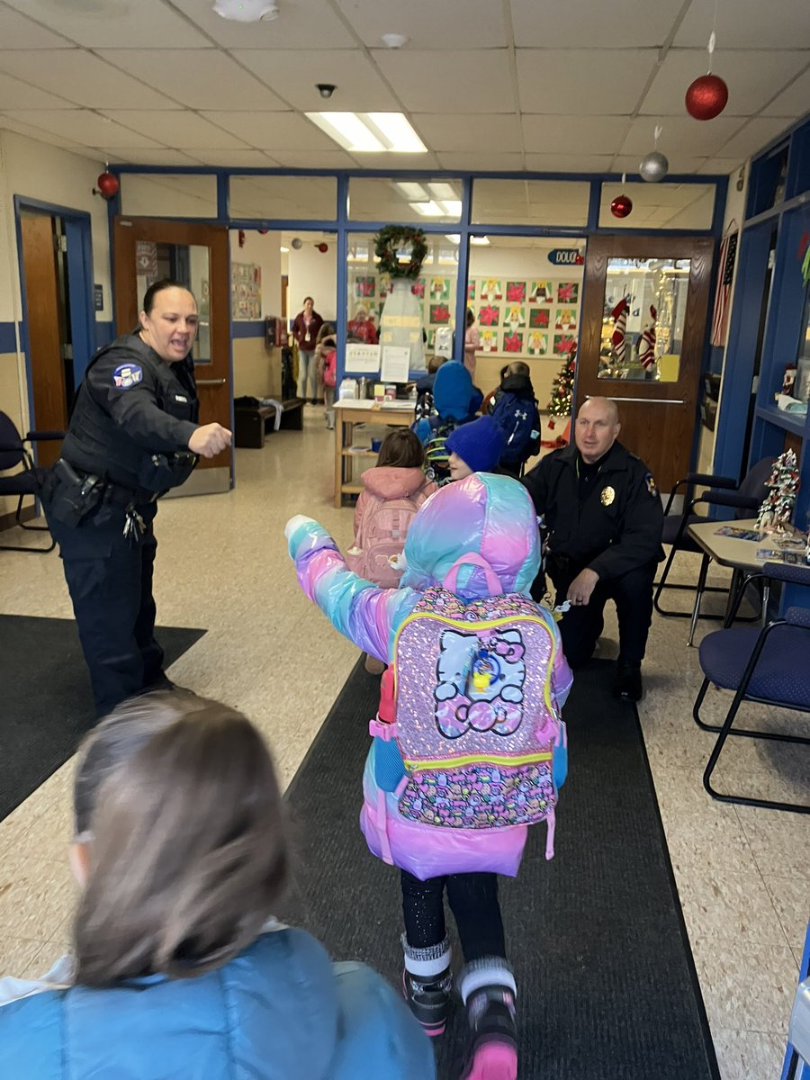 SochaCindy's tweet photo. Fist bumping with the Police Dept and Finn! So much fun! @DouglasSuper1 @Douglasmapd https://t.co/ljaazuDwzr
