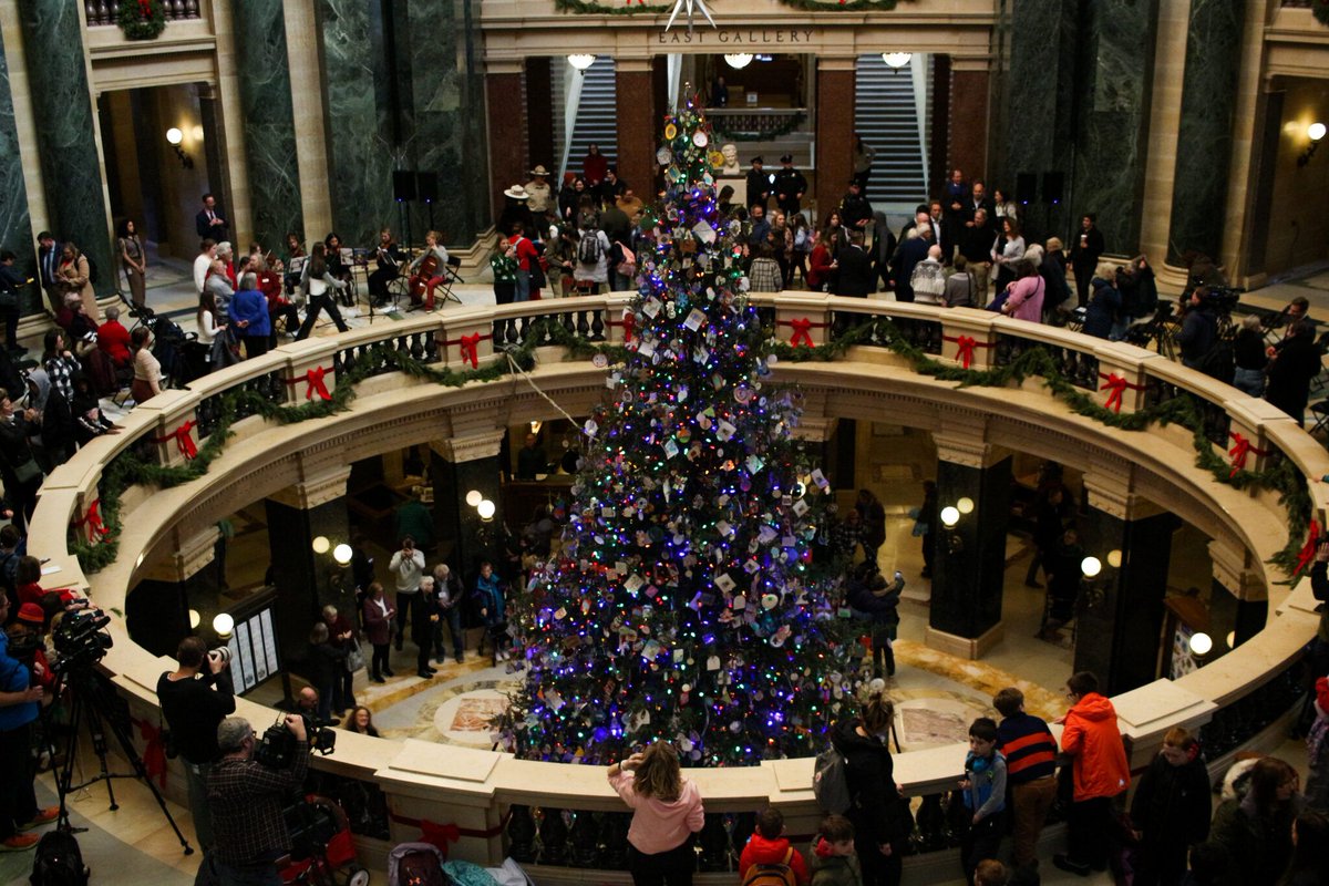 WIExaminer's tweet image. Reporter @HenryRedrobin captures the scene at the Capitol holiday tree lighting, where @GovEvers reveals he's picked a new @WDNR secretary and comments on the coming session of the Legislature. buff.ly/4f6HS0Q