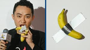 TXDNETWORK's tweet photo. Cryptocurrency entrepreneur Justin Sun stunned the world by purchasing Maurizio Cattelan's 'Comedian'—a banana taped to a wall—for a jaw-dropping R112 million, then ate it on the spot! 📷📷 “It’s quite good,” he quipped, blending art and absurdity. #BananaArt #JustinSun #ArtWorld https://t.co/KgMpBELMg6