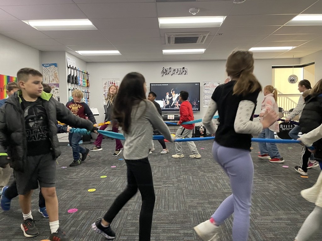 4th Grade got to experience the parachute and stretchy band with music from the Nutcracker today! It was so much fun and a lot of smiles and laughter were had.