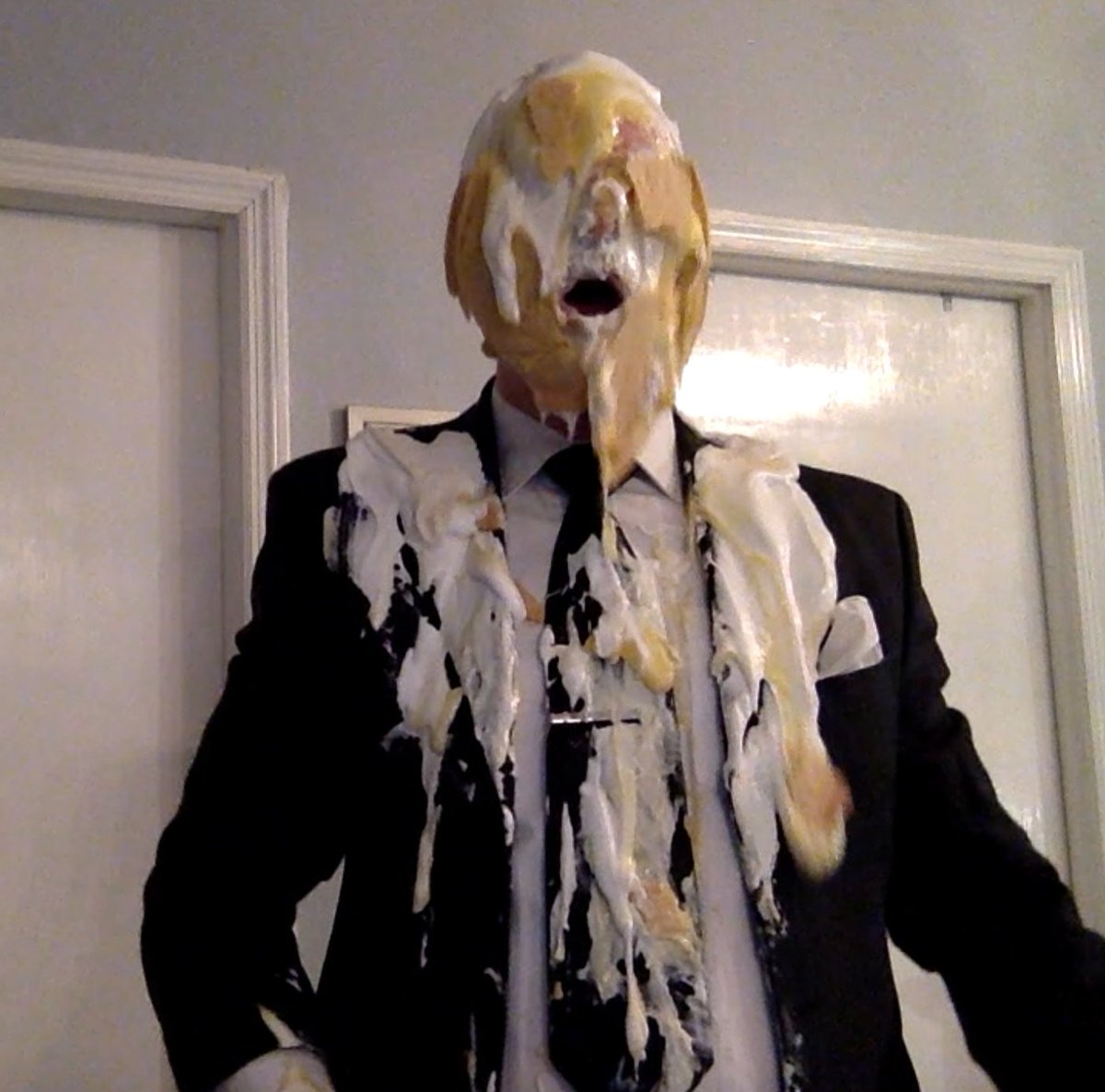 black suit pie                                                                                                    #gunge #messy #pie #pieintheface #suit #tie