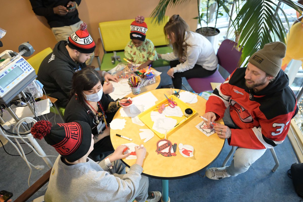 RWJUH's tweet photo. Skating into the holiday spirit 🎄🏒 Huge thanks to the @NJDevils players, @therealjdowls and @Nathan_Legare, for bringing their A-game to our pediatric patients--playing nok hockey, coloring and spreading cheer. #LetsBeHealthyTogether https://t.co/SAhFj79a0K