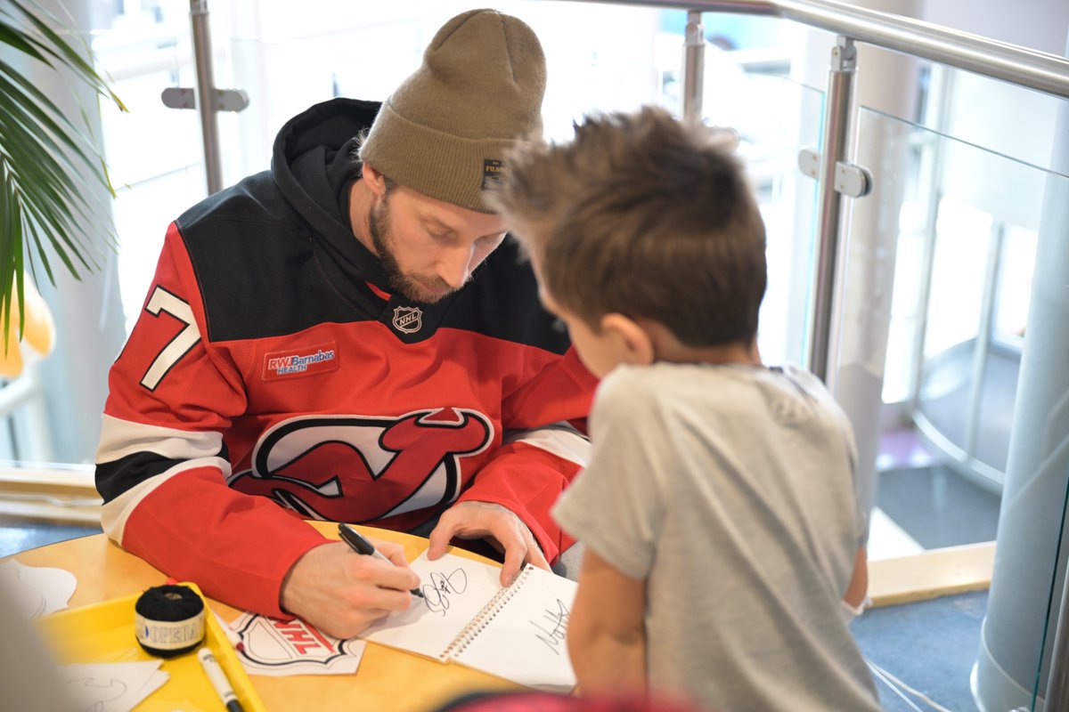 RWJUH's tweet photo. Skating into the holiday spirit 🎄🏒 Huge thanks to the @NJDevils players, @therealjdowls and @Nathan_Legare, for bringing their A-game to our pediatric patients--playing nok hockey, coloring and spreading cheer. #LetsBeHealthyTogether https://t.co/SAhFj79a0K
