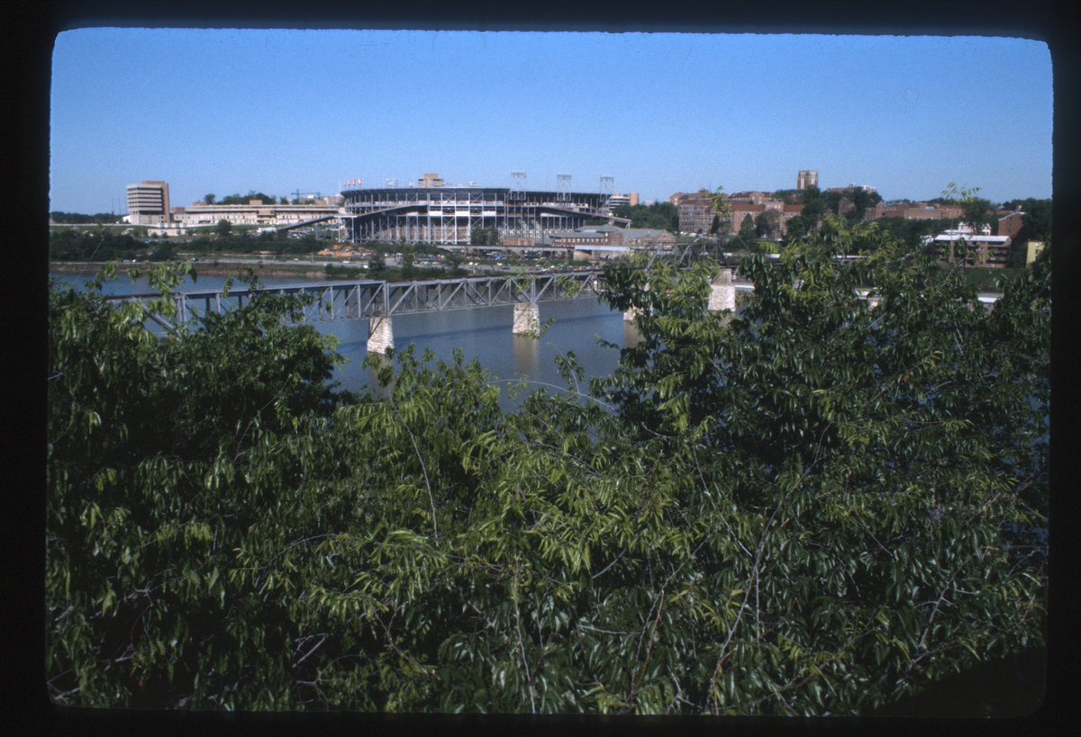 zachkeith's tweet photo. Images of the newly-built Communications Building with Neyland Stadium in the background from 1969. The shot from across the river is from 1978 and the aerial photo showing Neyland still as a horseshoe is from
1962. All from the Yale Avenue Redevelopment Project series. https://t.co/1MT4JsWH5J