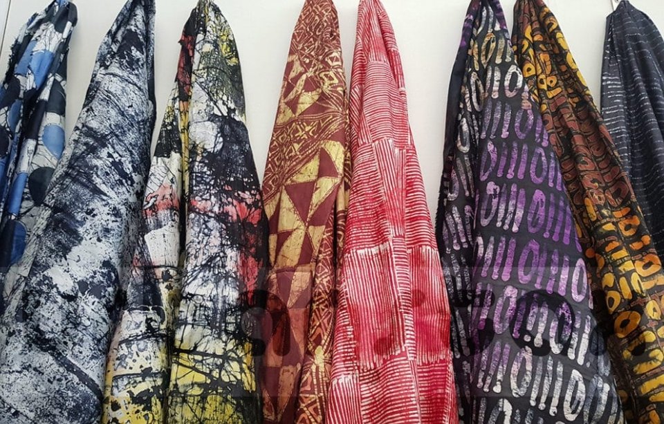 One significant art form from Nigeria is Adire, a traditional Yoruba cloth dyeing technique. Adire, which means "tie and dye" in the Yoruba language, is renowned for its intricate patterns and vibrant colors, serving both as a functional textile and a profound cultural