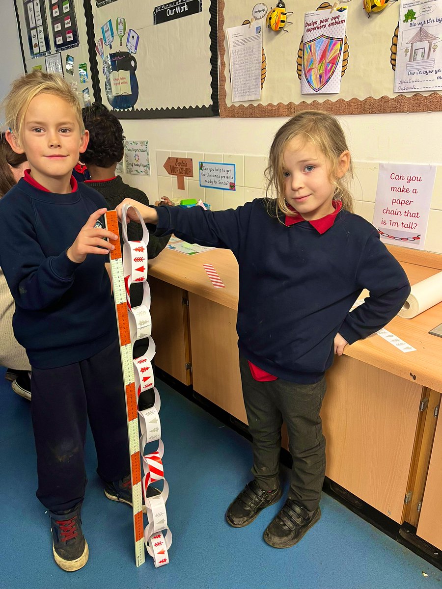 Hendrefoilan's tweet photo. Year 1/2 Turtles enjoyed a break from rehearsals to do some Christmas themed maths. Matching presents to their 3D shape name, weighing them and making a paper chain that is 1m long. #hdfpturtles #hdfpNum https://t.co/AfMGyJ91id
