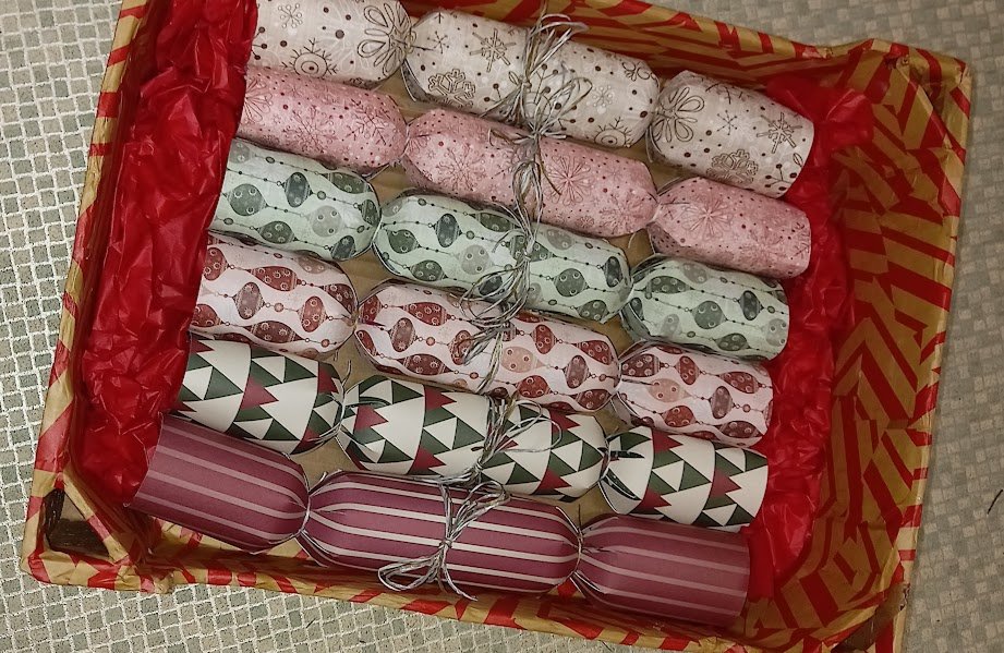 Have spent flamin' ages today crafting this box of hand made crackers with their hand made contents to send off to family. Only to flamin' find that you can't flamin' send hand made crackers in the flamin' post.
Apparently they're classed as flamin' incendiary devices!