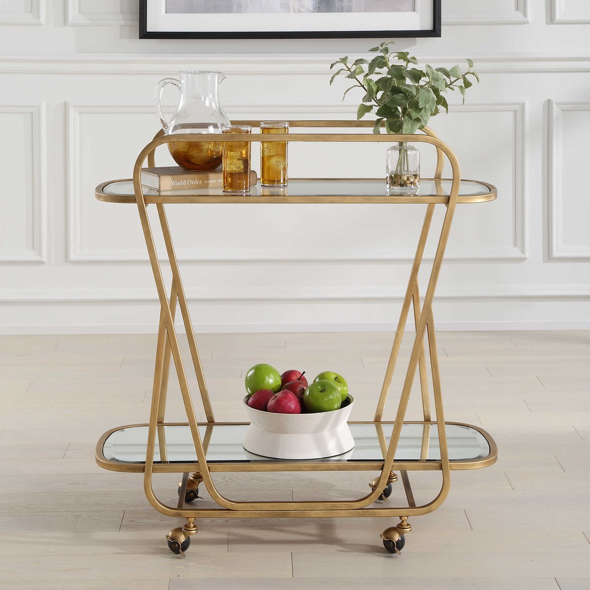 Cheers to Friday! 🥂

This beautiful, forged serving cart in antique brass made completely of iron with a double mirrored tray adds a touch of sophistication to any room.

Shop our entire collection of bar carts by clinking here - l8r.it/evEO
