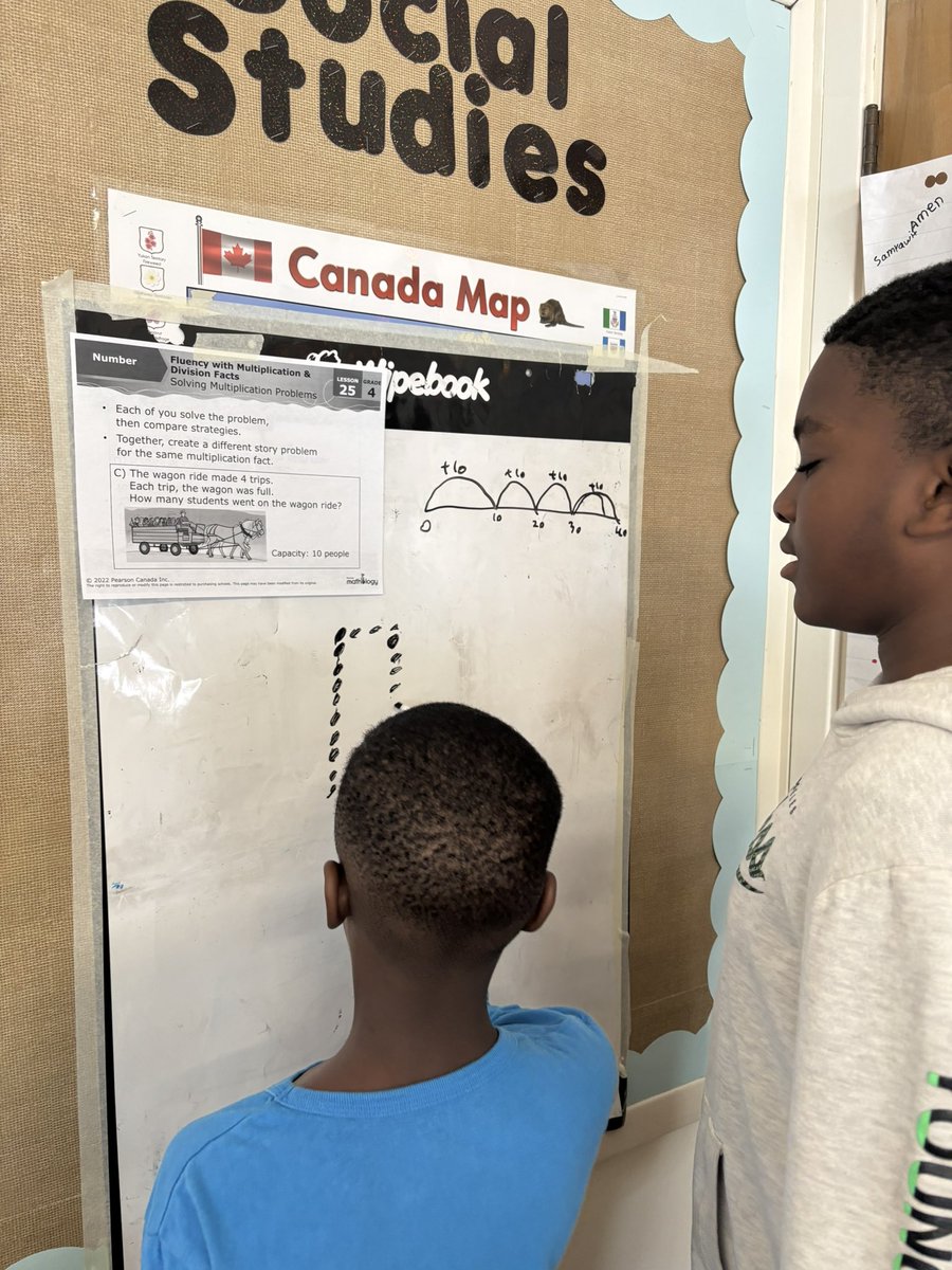 MissIngoldsby's tweet photo. Solving some @PearsonMatholo1 multiplication word problems using our #ThinkingClassroom setup! https://t.co/ELzfyNSdg0