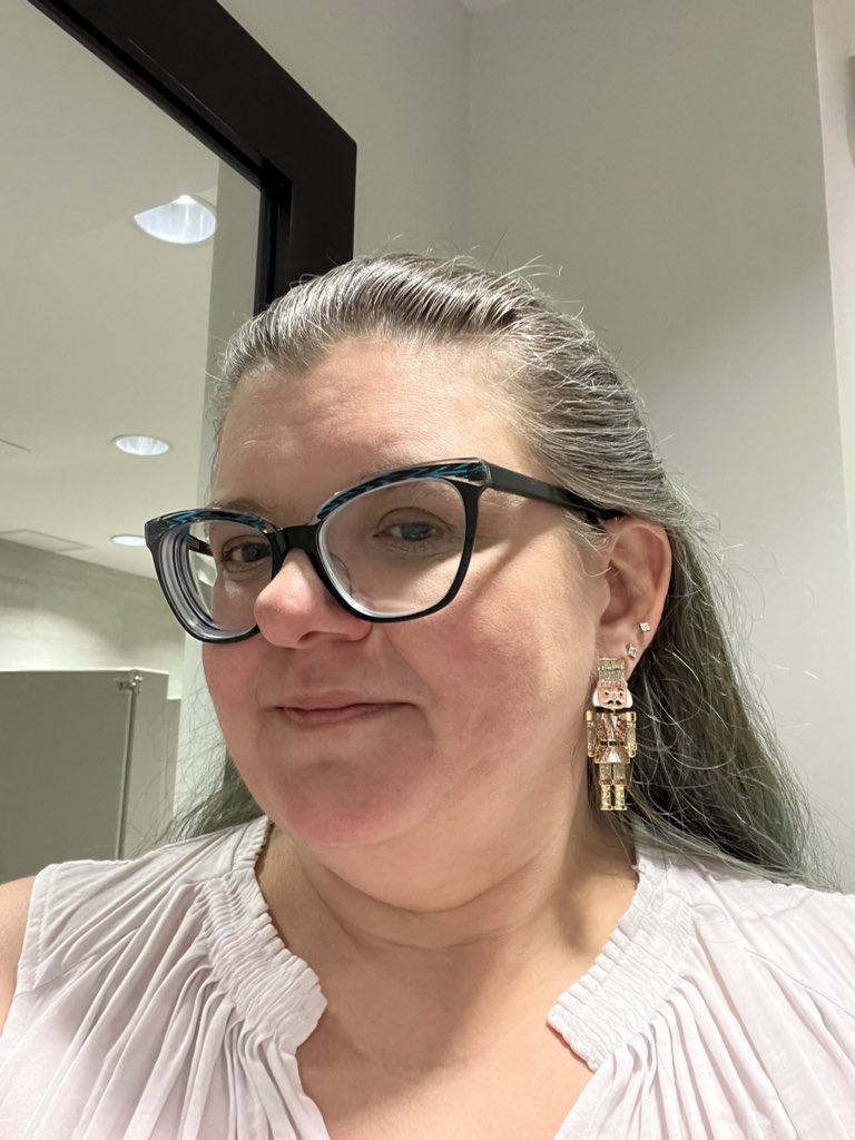 Styling for my holiday lunch! (With the nutcracker earrings my husband hunted down at Aldi)