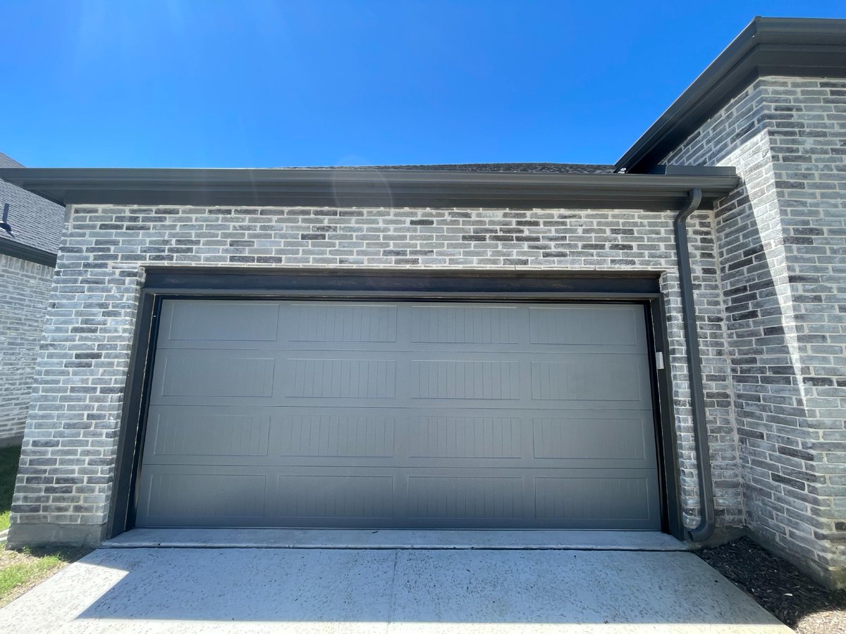 PlanoOverhead's tweet photo. We just installed a stunning Graphite Carriage House garage door for our amazing customer! The rich color and classic design elevate this home’s curb appeal to a whole new level. Thank you for trusting us with your garage door transformation! Ready for your upgrade? Reach us a... https://t.co/jw71WC9KVf