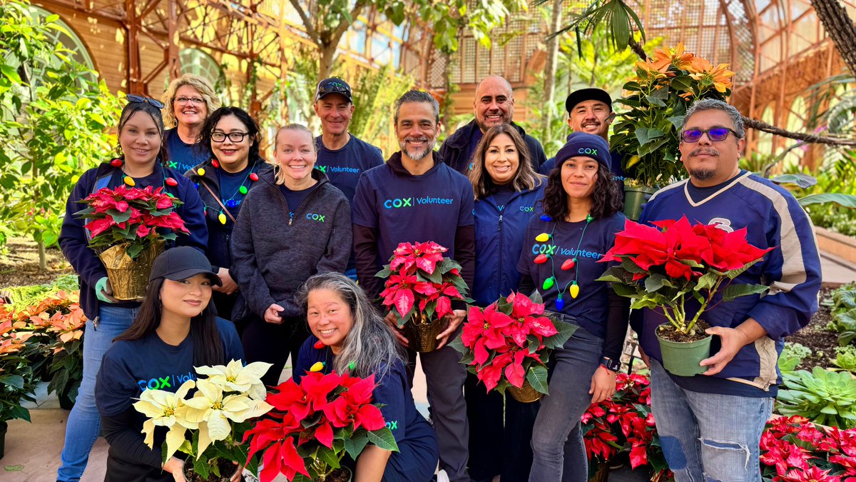 CoxCalifornia's tweet photo. .@CoxComm volunteers spent their morning decking the halls with poinsettias at the newly renovated @SDBGarden. With the ribbon cut this morning, doors are open to the public during @CityofSanDiego December Nights @BalboaPark! #CoxConserves https://t.co/cji5uz7XQO