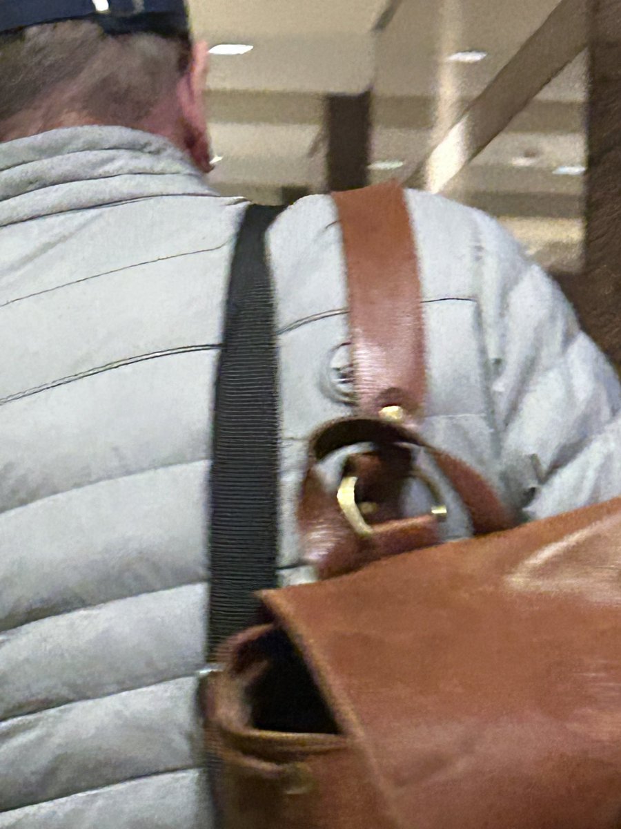 JohnsonWales11's tweet photo. Stud wearing a Peter puffer into the office. Wonder what this guy’s burner is. https://t.co/BXzMaZ2145