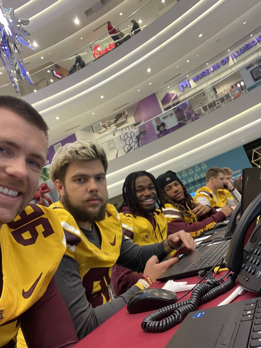 Minnesota Football Player Development (@mnfbdev) on Twitter photo 15 went to MOA to man the phones for a shift at the KS95 Radiothon benefiting the Masonic Children’s Hospital.
<a href="/dragan_serb8/">Dragan Kesich</a> <a href="/Mark_Crawford96/">Mark Crawford</a> <a href="/JaionteM/">Jai’Onte’ McMillan</a> <a href="/PhilDaniels77/">Phillip Daniels</a> <a href="/DisanoJack/">Jack DiSano</a> <a href="/sampetersss/">Sam Peters</a> <a href="/AlanSoukup_/">Alan Soukup</a> <a href="/SamuelMadu33/">Samuel Madu✞</a> <a href="/caleb_mcgrath23/">Caleb McGrath</a> <a href="/d_legrant/">Cortez D. LeGrant Jr.</a> <a href="/Adam_kissayi/">Adam Kissayi</a> 15 went to MOA to man the phones for a shift at the KS95 Radiothon benefiting the Masonic Children’s Hospital.
<a href="/dragan_serb8/">Dragan Kesich</a> <a href="/Mark_Crawford96/">Mark Crawford</a> <a href="/JaionteM/">Jai’Onte’ McMillan</a> <a href="/PhilDaniels77/">Phillip Daniels</a> <a href="/DisanoJack/">Jack DiSano</a> <a href="/sampetersss/">Sam Peters</a> <a href="/AlanSoukup_/">Alan Soukup</a> <a href="/SamuelMadu33/">Samuel Madu✞</a> <a href="/caleb_mcgrath23/">Caleb McGrath</a> <a href="/d_legrant/">Cortez D. LeGrant Jr.</a> <a href="/Adam_kissayi/">Adam Kissayi</a>