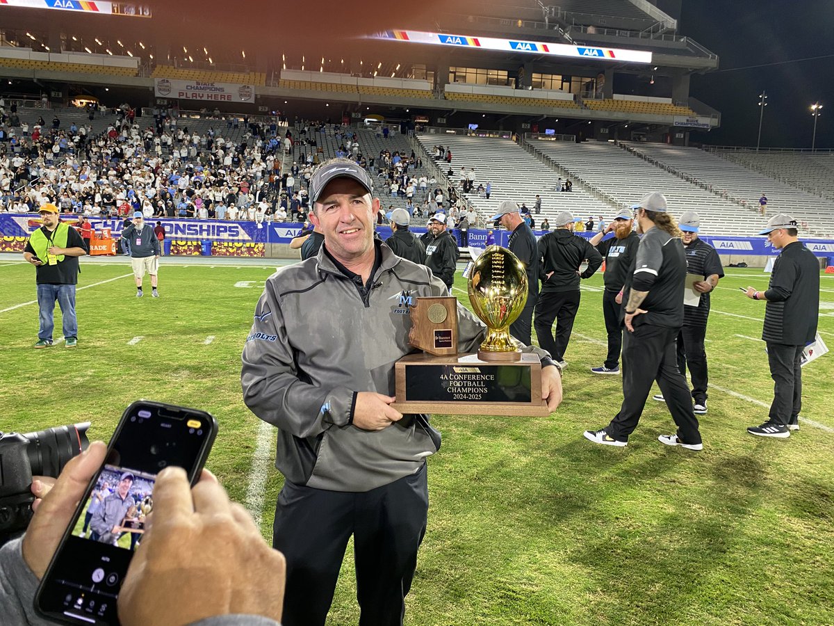 Mica Mountain HC Pat Nugent with the Gold Ball. Thunderbolts take 4A in their 3rd full varsity season.