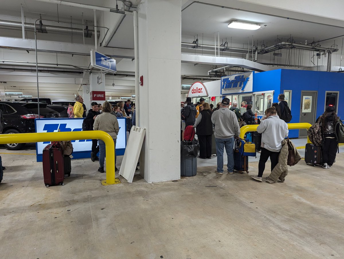 GrumpySteen's tweet photo. @thriftycars People have been waiting for over two hours because of the incompetence and overbooking at the Tampa airport. If that's not your idea of a vacation, don't book with Thrifty. https://t.co/XIMhZIr7Da