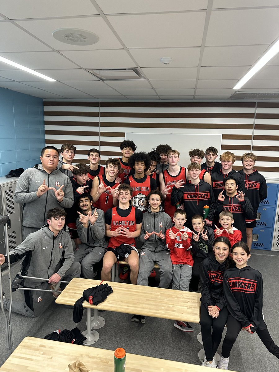 HHSChargerHoops's tweet photo. Chargers came away with a program sweep tonight 🧹 defeating Tosa East at all levels!  Varsity won 70-60 and the effort belt went to Zimir Boyden!  Thanks to all the ⁦@TheHamHouse⁩ family and friends for the support on the road! https://t.co/CiEG5Ch71z